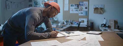 Kodi Whitfield sketching athletic shoe designs