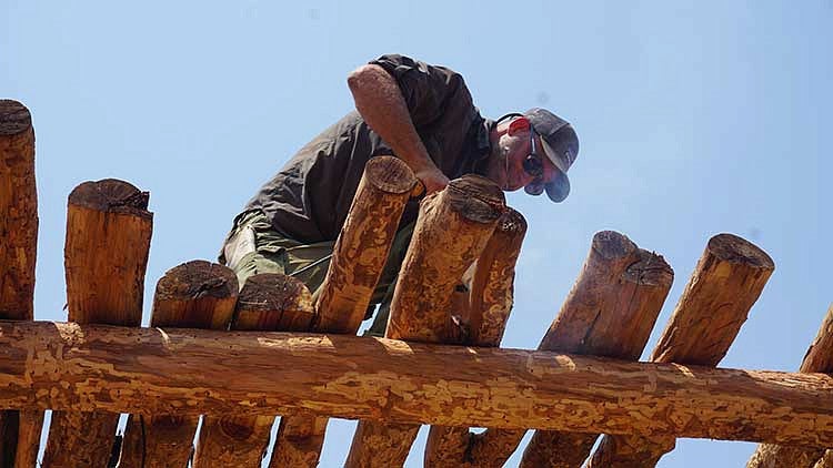 Jess Kokkeler helping to build the lookout tower