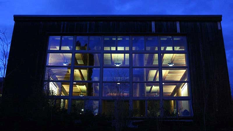 The Many Nations Longhouse at night