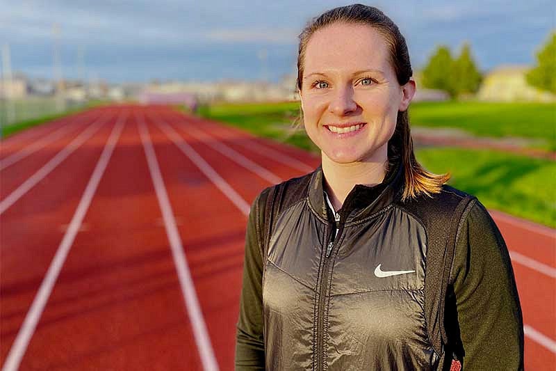 Megan Patrignelli in front of a track