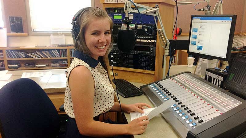 Franziksa Monahan working at a sound mixing board