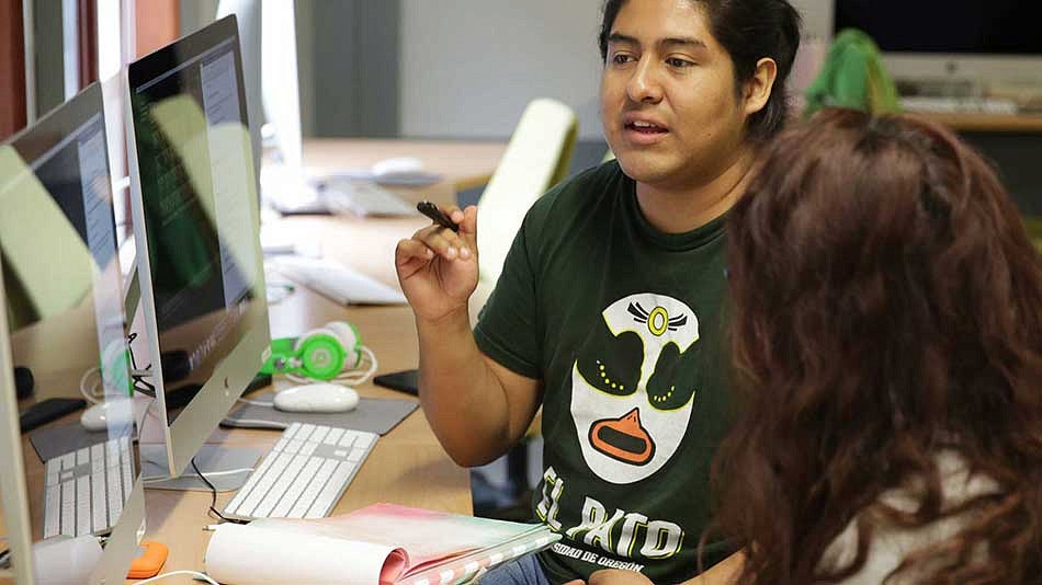 Romario Garcia working at a computer