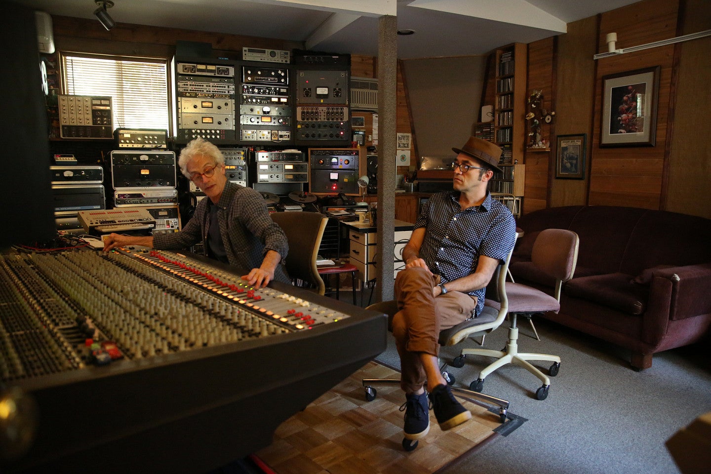 Steve Perry in the recording studio behind the soundboard