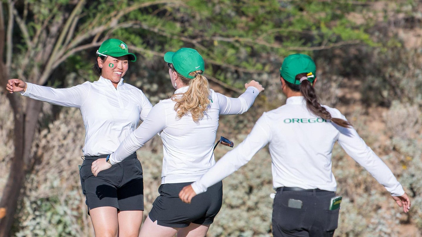 uo women golfers celebrating