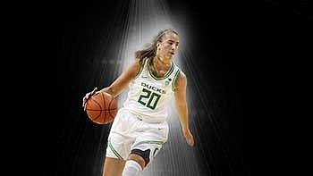 Sabrina Ionescu dribbing a basketball