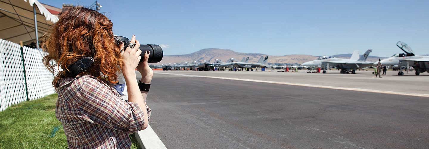 Hannah Steinkopf-Frank photographing military aircraft Hannah Steinkopf-Frank photographing military aircraft