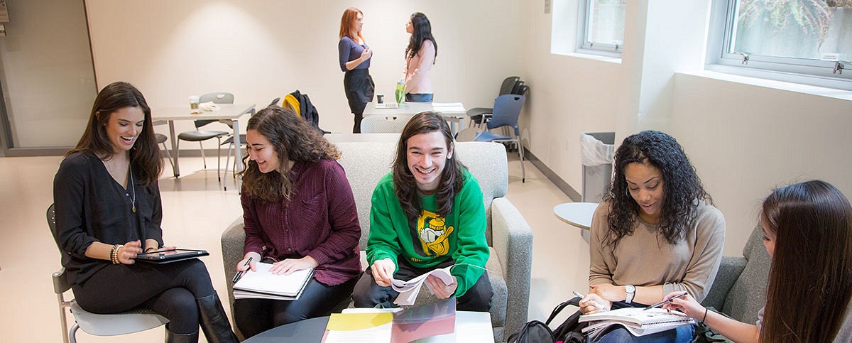 Students studying in a dorm common area