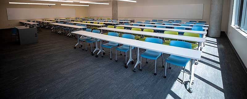 An empty classroom inside Tykeson Hall