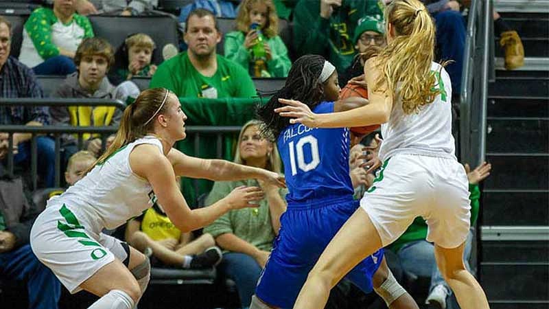 Sabrina Ionescu and Lydia Giomi playing defense against Venessannah Itugbu