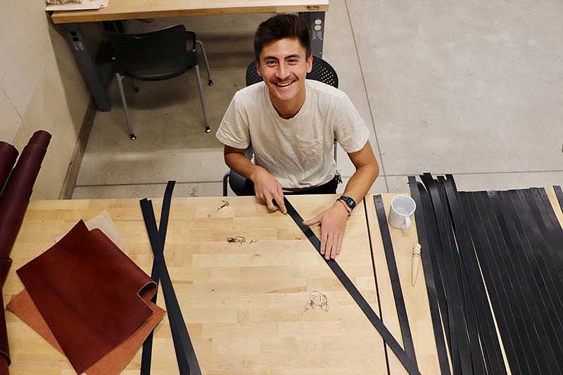 Xander Cuizon Tice working at a studio table