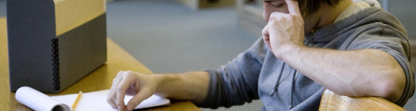 A student doing research in the UO Libraries' special collections