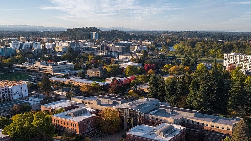 aerial view of Eugene and the UO campus with fall foliage