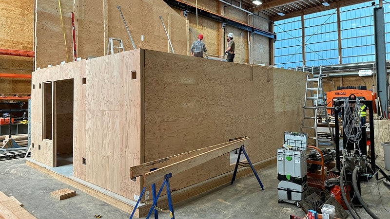 A prototype mass timber house under construction