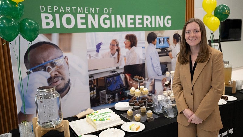 Kylie Williams at a reception after defending her doctoral thesis