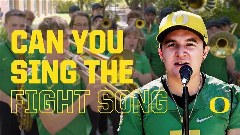 UO marching band with person singing at microphone