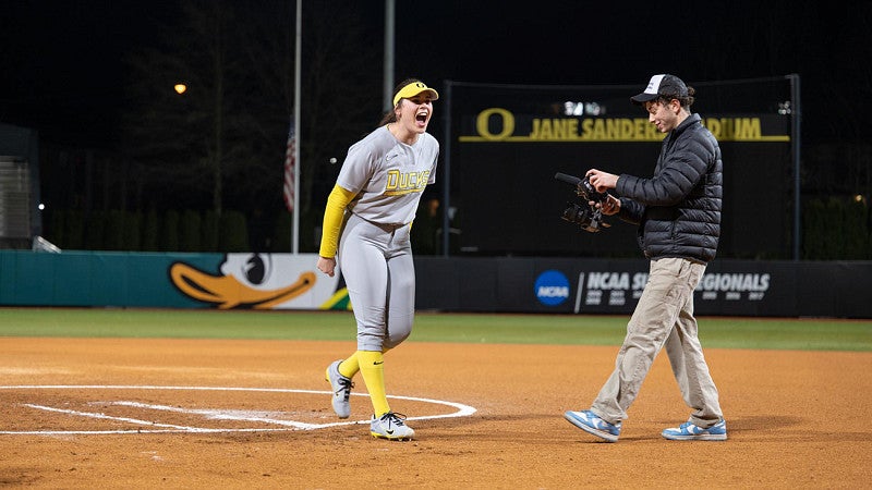 UO softball player on field