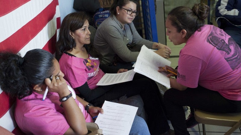 A group reading their stories