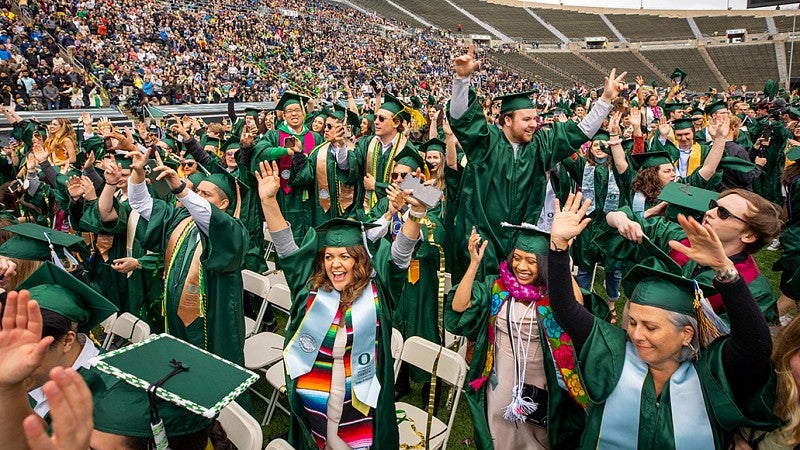 Graduates celebrate at Autzen