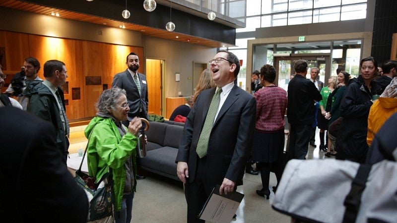 President Schill with professor Judith Eisen