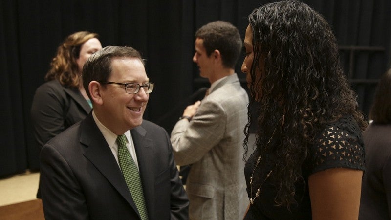 President Michael Schill with students