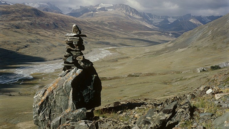 Stacked rocks overlooking the upper Tsagaan Gol and Tavan Bogd. Photo: Gary Tepfer.