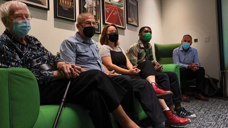 Ramey, Romm, Bui, McBride, and Henningsen toured reimagined rooms once home to 1960s late-night “bull sessions”