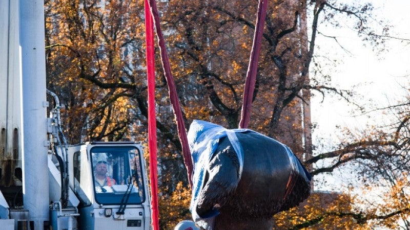 Crane lowering sculpture