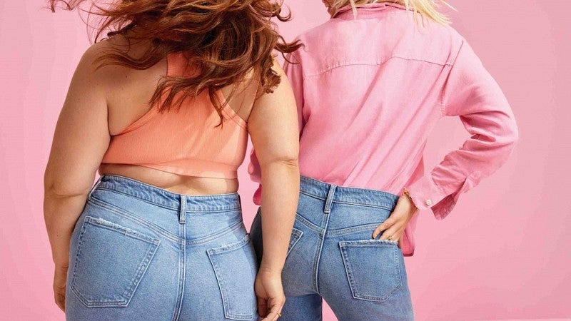 Two models wearing jeans