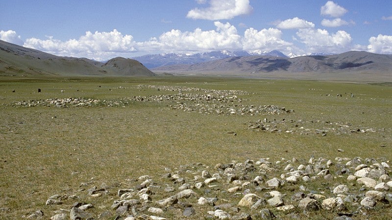 Early Iron Age burial mounds at Khara Zharyk; looking south to the border of northern China. Photo: Gary Tepfer.