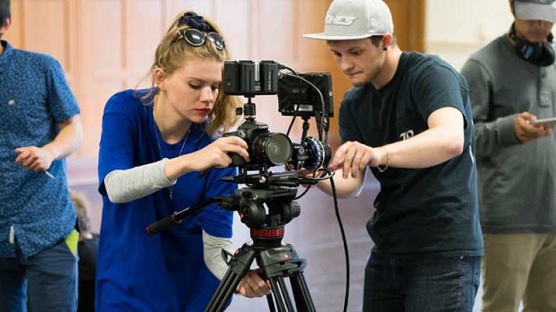 Students working with a camera.