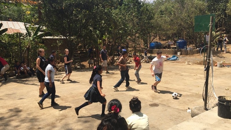 Children playing on the finished court.