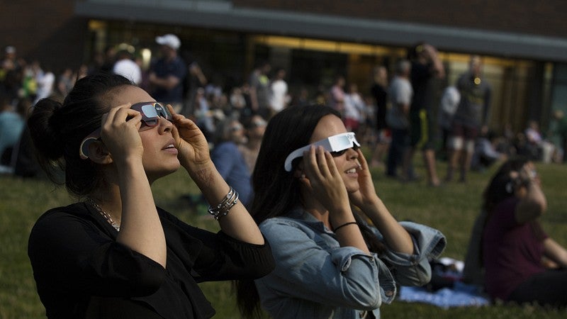 Students watch in awe as campus goes dark during the eclipse