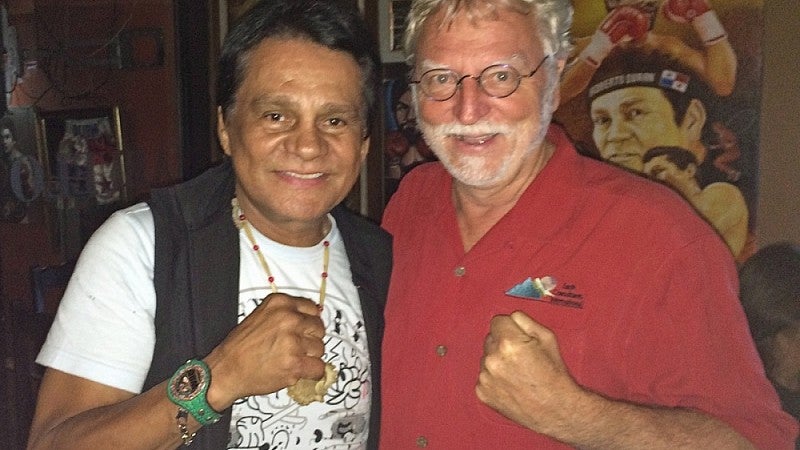 Boxer Roberto Duran with geologist Eldon Gath