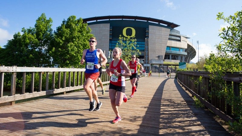 Runners near Autzen Stadium