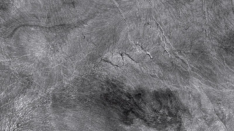 NASA satellite image of a region of the Greenland ice sheet, showing streams on the surface