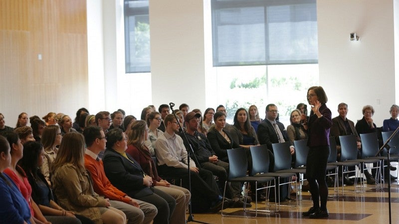 Gov. Kate Brown speaking with students at the UO April 25