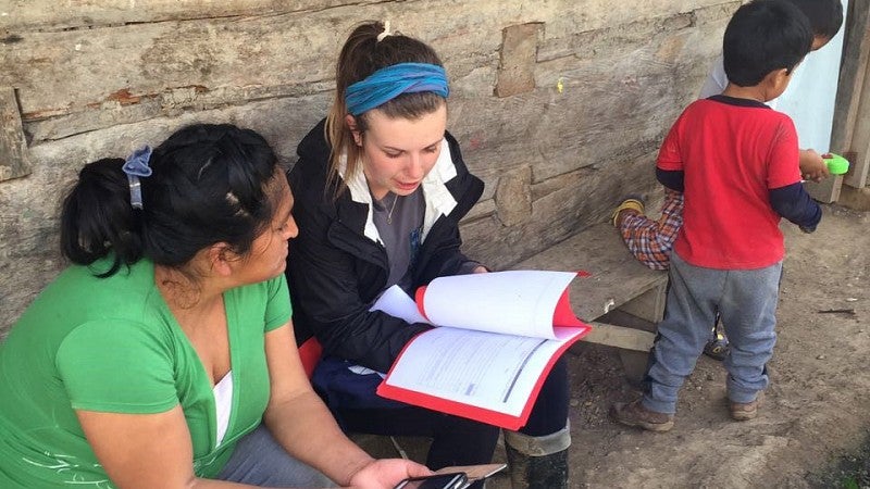 UO grad Jessica Gudgell during a house visit