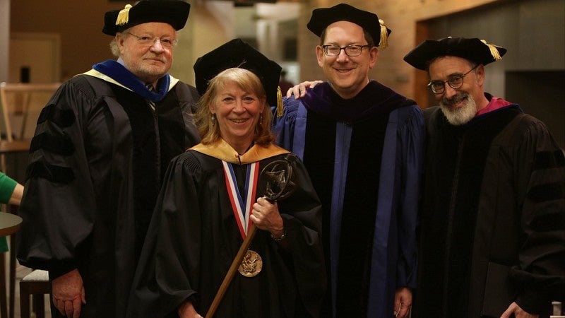 From left: Chuck Lillis, Geri Richmond, Michael Schill, Paul Peppis