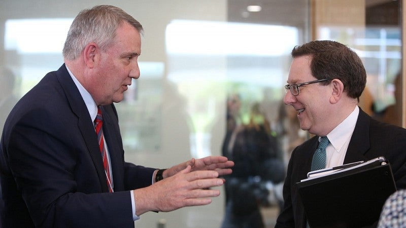 OHSU President Joe Robertson (left) and UO President Michael Schill