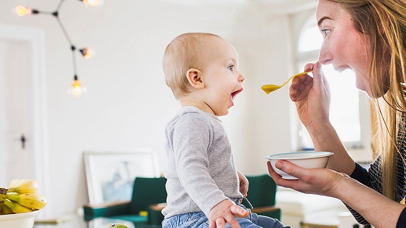 Mother feeding baby