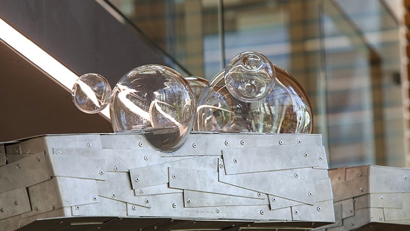 Bubbles also float on top of the sculpture