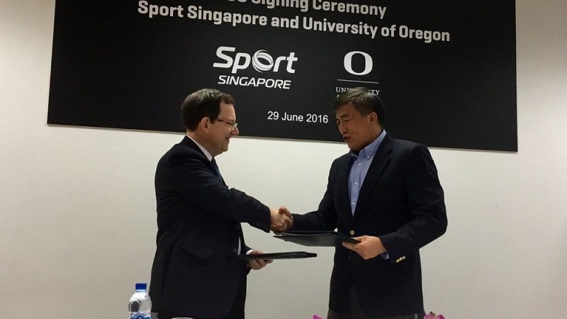 President Schill signing MOU at Sport Singapore