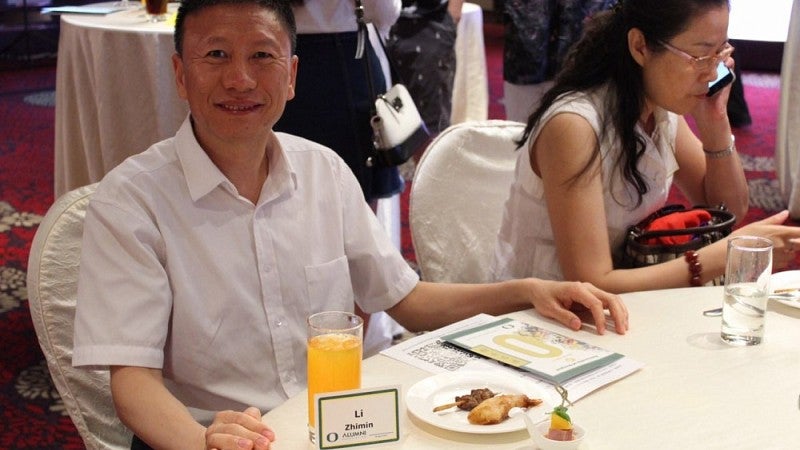 A UO alumnus at a gathering in Beijing