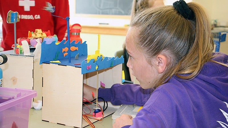 SPICE Camp participant at her automata