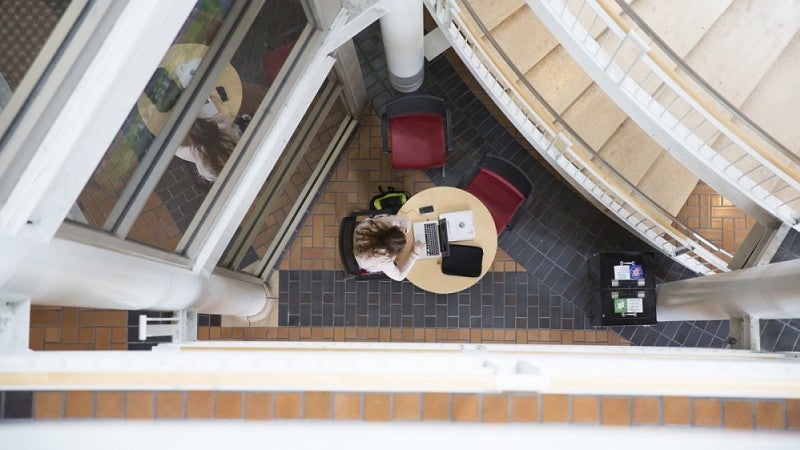 Overhead photo of student studying at desk