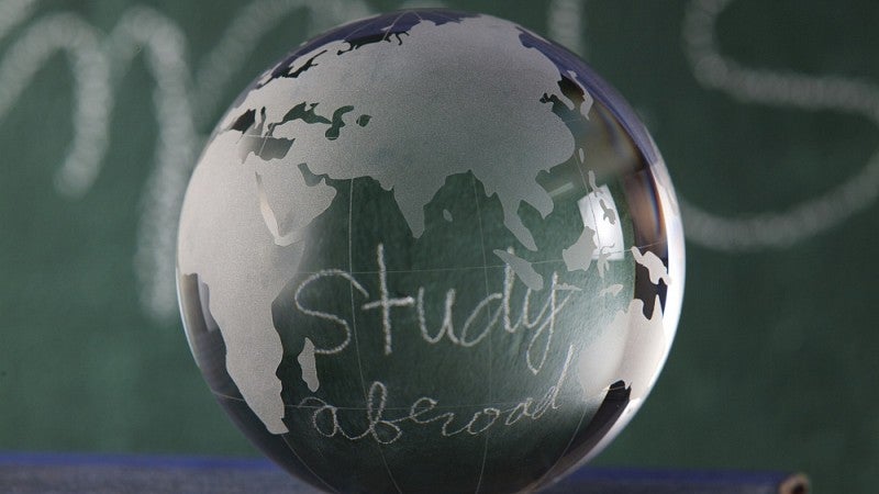 Crystal globe with 'study abroad' written on it.