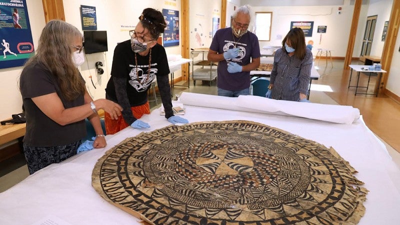 Researchers looking at tapa cloth