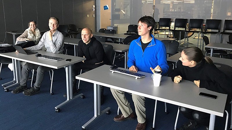 Designers from 13&9 collaborating with three UO grad students 