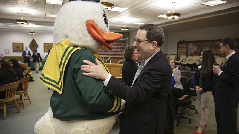 The Duck and UO President Michael Schill