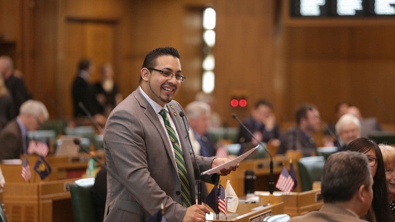 State Rep. Diego Hernandez extends courtesies to UO advocates from the House floor.